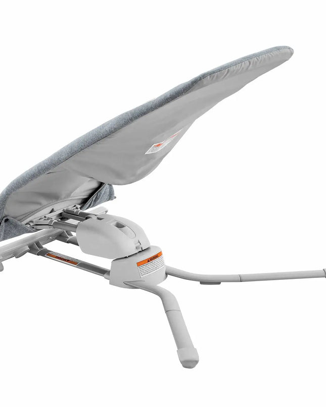Gray saddle with a white base and orange accents on a white background