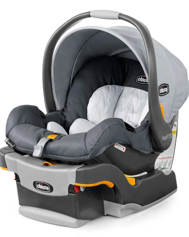 Gray and black Chicco car seat on a white background