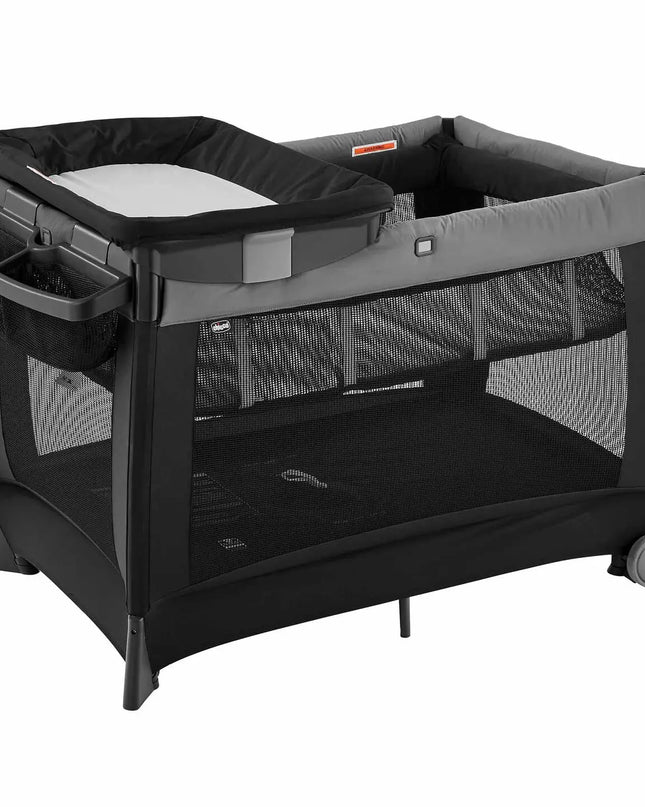Black and gray portable crib on a white background