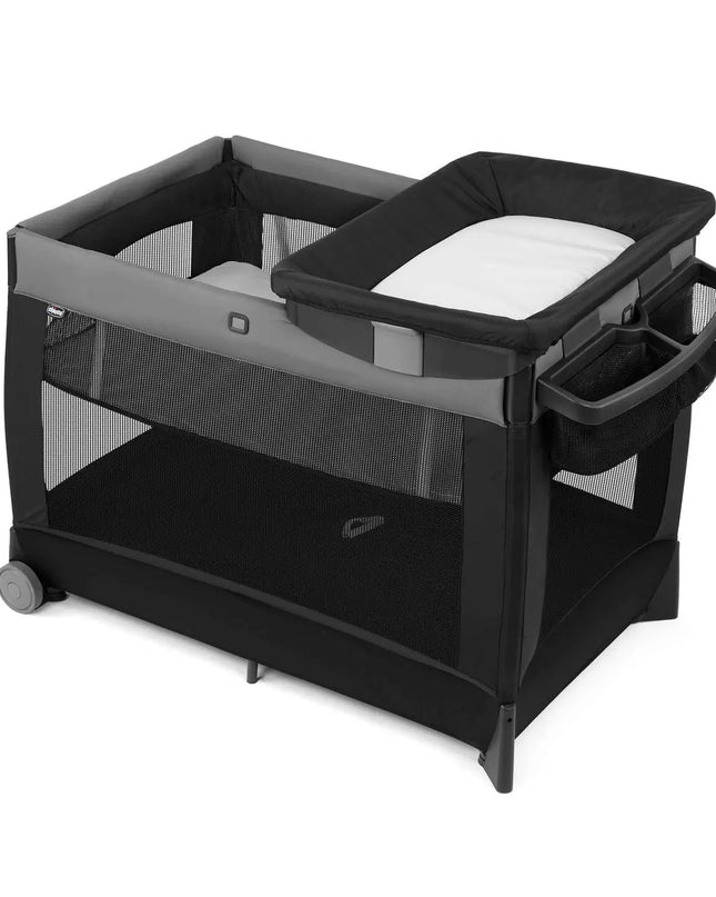 Portable baby playpen with changing table on a white background
