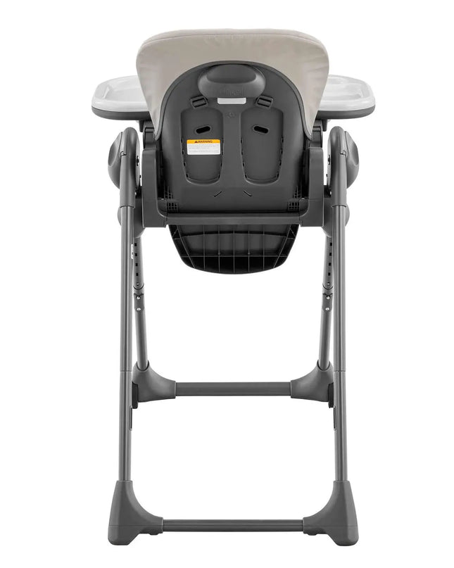 Gray high chair with a white tray on a white background